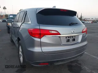 2014 Acura RDX with VIN 5J8TB3H3XEL005947, listed as a IAAI auction lot 41999309 with 133,531 mi miles and . Bid and sale history available at DreamBid. Image 3.