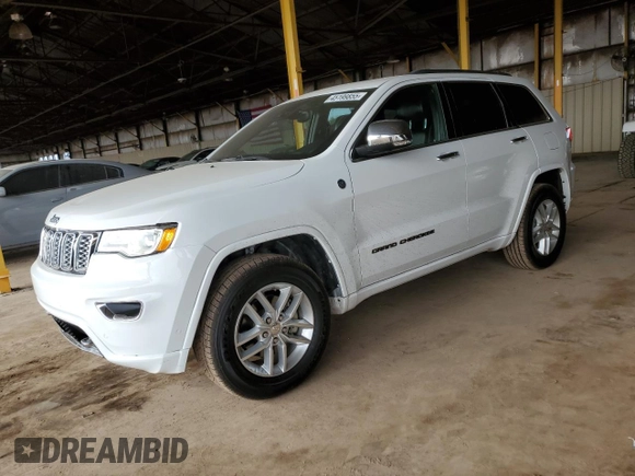 2017 Jeep Grand Cherokee Overland with VIN 1C4RJFCG2HC834328, listed as a Copart auction lot 45199855 with 87,061 mi miles and Salvage Title. Bid and sale history available at carsss.com. Image 1.