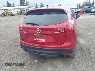 2016 Mazda CX-5 Touring with VIN JM3KE4CY2G0894930, listed as a IAAI auction lot 41906809 with 123,125 mi miles. Bid and sale history available at carsss.com. Image 16.