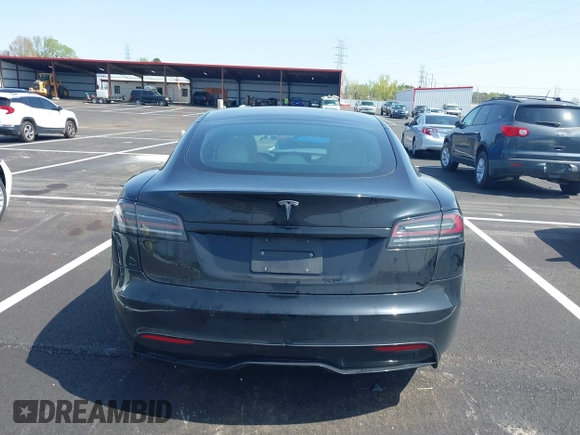 2022 Tesla Model S z VIN 5YJSA1E56NF490064, wystawiony jako IAAI lot #41858477 z przebiegiem Nie podano mil oraz . Historia ofert i sprzedaży dostępna na DreamBid. Obrazek 16.
