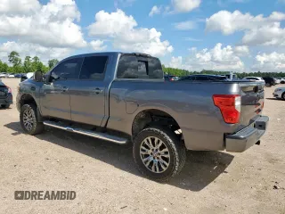 2016 Nissan Titan Platinum Reserve with VIN 1N6BA1F49GN503106, listed as a Copart auction lot 62740215 with 155,659 mi miles and Clean title. Bid and sale history available at DreamBid. Image 2.