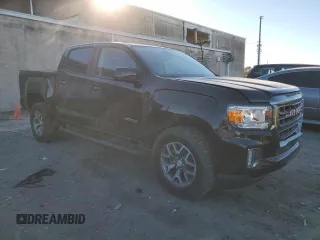2021 GMC Canyon 4WD AT4 w/Cloth with VIN 1GTG6FEN5M1100096, listed as a Copart auction lot 77535584 with 25,152 mi miles and Salvage Title. Bid and sale history available at carsss.com. Image 4.