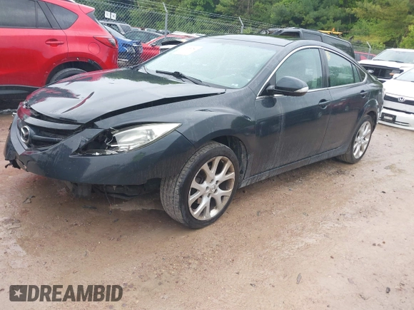 2013 Mazda 6 i Touring Plus z VIN 1YVHZ8EHXD5M12743, wystawiony jako IAAI lot #42365284 z przebiegiem 131 900 mil mil oraz . Historia ofert i sprzedaży dostępna na DreamBid. Obrazek 17.