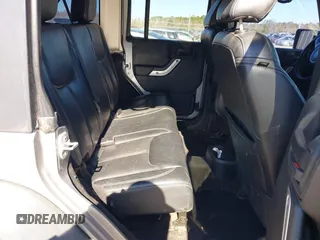 2015 Jeep Wrangler Unlimited Rubicon Hard Rock with VIN 1C4HJWFG2FL587607, listed as a IAAI auction lot 41419237 with 109,719 mi miles and . Bid and sale history available at DreamBid. Image 8.