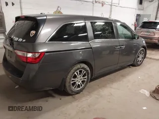 2011 Honda Odyssey EX-L with VIN 5FNRL5H67BB049446, listed as a IAAI auction lot 42116436 with 197,667 mi miles and . Bid and sale history available at carsss.com. Image 4.