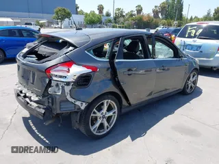 2015 Ford Focus Titanium with VIN 1FADP3N27FL380525, listed as a IAAI auction lot 42493542 with 86,423 mi miles and . Bid and sale history available at DreamBid. Image 4.