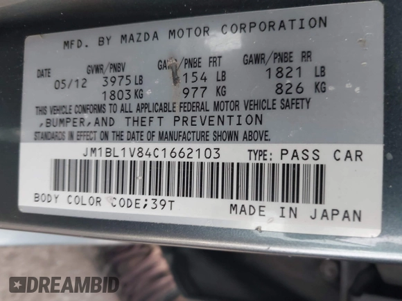 2012 Mazda Mazda3 i Touring with VIN JM1BL1V84C1662103, listed as a IAAI auction lot 41839142 with 153,158 mi miles. Bid and sale history available at carsss.com. Image 9.