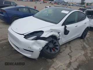 2022 Tesla Model Y Performance with VIN 7SAYGDEF0NF400560, listed as a IAAI auction lot 41783912 with 36,513 mi miles and . Bid and sale history available at DreamBid. Image 20.