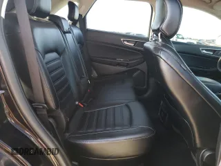 2019 Ford Edge SEL z VIN 2FMPK4J91KBC60322, wystawiony jako Copart lot #53502375 z przebiegiem 103 430 mil mil oraz Szkoda całkowita • Salvage title. Historia ofert i sprzedaży dostępna na DreamBid. Obrazek 11.