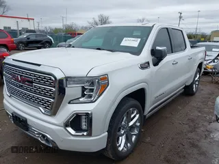 2020 GMC Sierra 1500 Denali with VIN 3GTU9FEL8LG295605, listed as a IAAI auction lot 41922060 with 65,561 mi miles and . Bid and sale history available at DreamBid. Image 2.