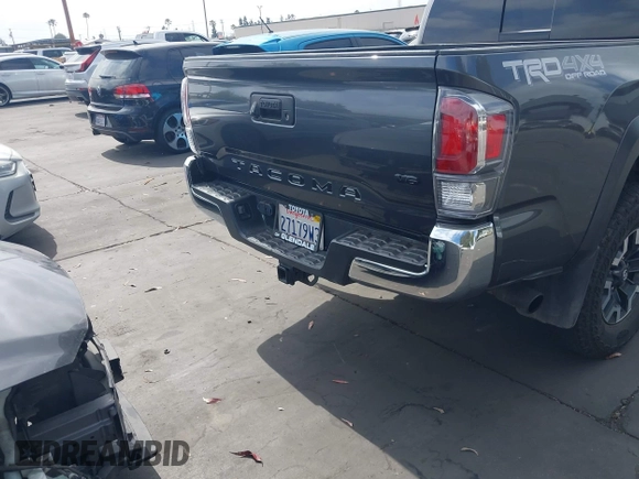 2023 Toyota Tacoma SR with VIN 3TMCZ5AN0PM635933, listed as a IAAI auction lot 42543126 with 32,960 mi miles and . Bid and sale history available at DreamBid. Image 17.