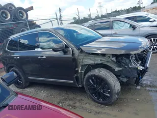 2022 Kia Telluride SX with VIN 5XYP5DHC3NG306763, listed as a IAAI auction lot 42267394 with 110,000 mi miles and . Bid and sale history available at DreamBid. Image 13.