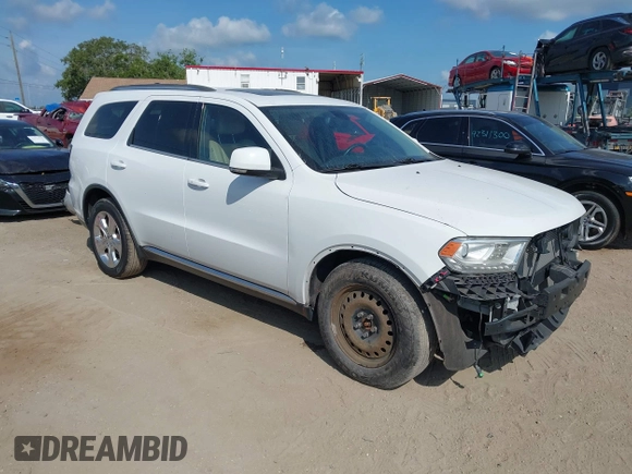 2014 Dodge Durango Limited with VIN 1C4RDJDGXEC323129, listed as a IAAI auction lot 42318727 with 148,451 mi miles and . Bid and sale history available at DreamBid. Image 1.