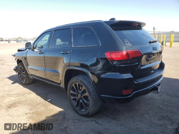 2021 Jeep Grand Cherokee Laredo X with VIN 1C4RJEAG0MC860983, listed as a Copart auction lot 57153715 with 59,697 mi miles and Clean title. Bid and sale history available at DreamBid. Image 2.