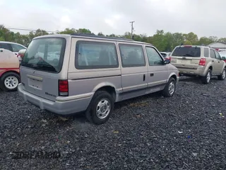 1992 Dodge Caravan Grand SE z VIN 1B4GH44R5NX258694, wystawiony jako IAAI lot #42197603 z przebiegiem 152 591 mil mil oraz . Historia ofert i sprzedaży dostępna na DreamBid. Obrazek 4.