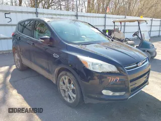 2013 Ford Escape SEL with VIN 1FMCU0H9XDUC42566, listed as a IAAI auction lot 42087717 with 233,091 mi miles. Bid and sale history available at carsss.com. Image 1.