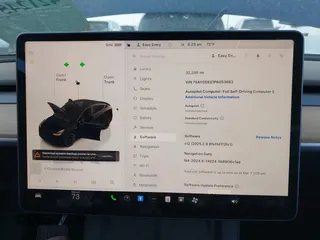 2023 Tesla Model Y Long Range with VIN 7SAYGDEE1PA053683, listed as a IAAI auction lot 42124517 with 32,295 mi miles. Bid and sale history available at carsss.com. Image 17.