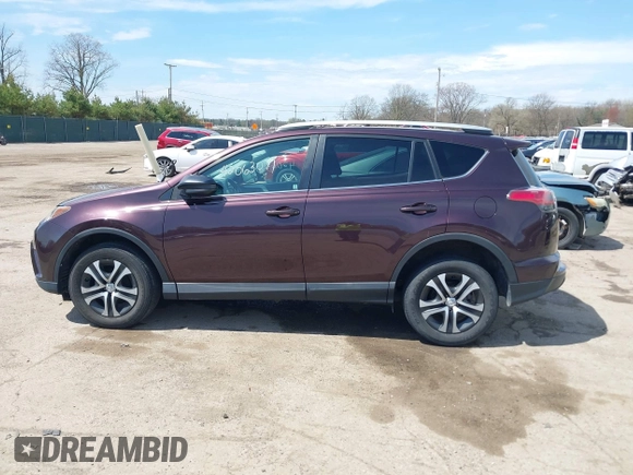 2016 Toyota RAV4 LE with VIN 2T3ZFREV8GW310580, listed as a IAAI auction lot 42063071 with 104,099 mi miles and . Bid and sale history available at DreamBid. Image 15.