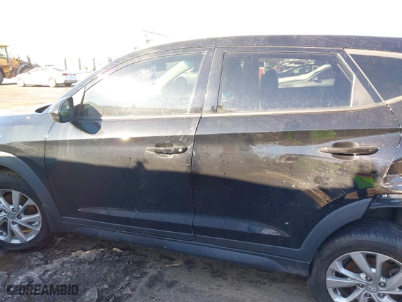 2019 Hyundai Tucson Value with VIN KM8J33A4XKU979791, listed as a IAAI auction lot 41255630 with 90,807 mi miles. Bid and sale history available at carsss.com. Image 14.