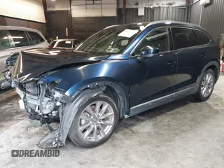 2020 Mazda CX-9 Grand Touring with VIN JM3TCBDY4L0403376, listed as a IAAI auction lot 42357363 with 86,716 mi miles and . Bid and sale history available at DreamBid. Image 2.