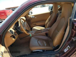 2006 Porsche Cayman S с VIN WP0AB29806U785415, выставлен на аукционе Copart как лот 52888794 с пробегом 106 896 миль миль и Списание • Salvage title. История ставок и продаж доступна на DreamBid. Изображение 7.