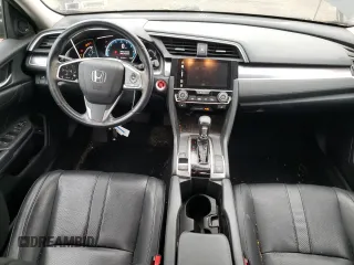 2017 Honda Civic EX-L with VIN 19XFC1F73HE201731, listed as a Copart auction lot 60104785 with 63,932 mi miles and Salvage title. Bid and sale history available at DreamBid. Image 8.