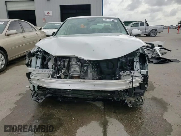 2024 Honda Civic LX z VIN 2HGFE2F27RH571446, wystawiony jako Copart lot #55157415 z przebiegiem 22 687 mil mil oraz Szkoda całkowita • Salvage title. Historia ofert i sprzedaży dostępna na DreamBid. Obrazek 14.