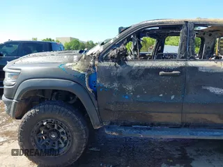2022 Ram 1500 TRX with VIN 1C6SRFU99NN151639, listed as a IAAI auction lot 42145733 with Not provided miles and . Bid and sale history available at DreamBid. Image 6.
