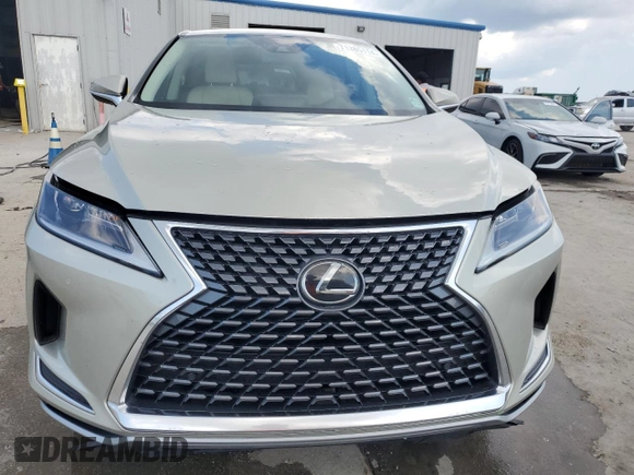 2020 Lexus RX with VIN 2T2AZMAA6LC168904, listed as a Copart auction lot 71385114 with 63,184 mi miles and Salvage Title. Bid and sale history available at carsss.com. Image 5.