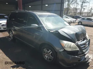 2005 Honda Odyssey EX-L with VIN 5FNRL387X5B069823, listed as a IAAI auction lot 41883007 with 267,250 mi miles. Bid and sale history available at carsss.com. Image 1.