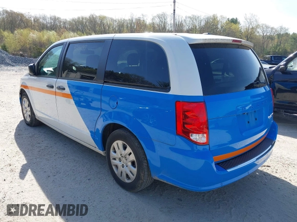 2019 Dodge Grand Caravan SE with VIN 2C4RDGBG8KR646829, listed as a IAAI auction lot 42136947 with 73,015 mi miles and . Bid and sale history available at DreamBid. Image 3.