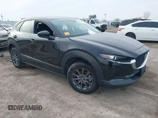 2021 Mazda CX-30 2.5 S with VIN 3MVDMAAL2MM303321, listed as a IAAI auction lot 41583346 with 57,122 mi miles. Bid and sale history available at carsss.com. Image 1.