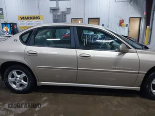 2004 Chevrolet Impala LS z VIN 2G1WH52K149186974, wystawiony jako IAAI lot #41913627 z przebiegiem 195 886 mil mil oraz . Historia ofert i sprzedaży dostępna na DreamBid. Obrazek 13.