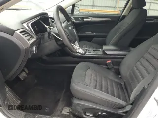 2018 Ford Fusion SE z VIN 3FA6P0LU2JR234975, wystawiony jako Copart lot #52562945 z przebiegiem 148 801 mil mil oraz Szkoda całkowita • Salvage title. Historia ofert i sprzedaży dostępna na DreamBid. Obrazek 7.