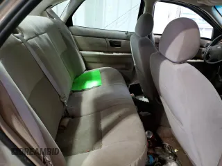 2003 Ford Taurus SE Standard z VIN 1FAFP532X3A195612, wystawiony jako Copart lot #54016645 z przebiegiem 143 168 mil mil oraz Szkoda całkowita • Salvage title. Historia ofert i sprzedaży dostępna na DreamBid. Obrazek 10.
