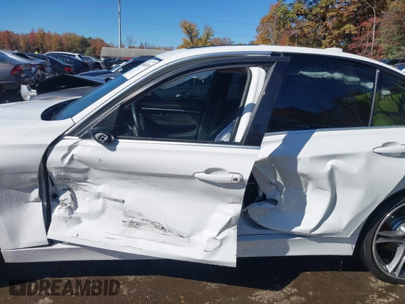2018 BMW 3 Series 330i xDrive with VIN WBA8D9G54JNU72412, listed as a IAAI auction lot 40660769 with 58,668 mi miles. Bid and sale history available at carsss.com. Image 14.