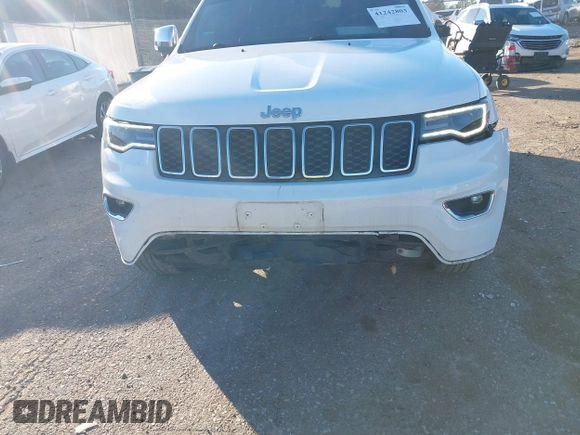 2017 Jeep Grand Cherokee Limited with VIN 1C4RJEBG8HC887899, listed as a IAAI auction lot 41242803 with 96,574 mi miles and . Bid and sale history available at DreamBid. Image 6.