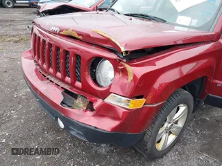 2014 Jeep Patriot Latitude with VIN 1C4NJRFB6ED892819, listed as a IAAI auction lot 42053389 with 92,213 mi miles and . Bid and sale history available at carsss.com. Image 6.