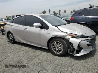 2020 Toyota Prius LE z VIN JTDKARFP6L3129457, wystawiony jako Copart lot #58416195 z przebiegiem 90 326 mil mil oraz Szkoda całkowita • Salvage title. Historia ofert i sprzedaży dostępna na DreamBid. Obrazek 4.