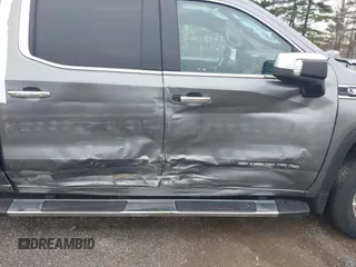 2021 GMC Sierra 1500 SLT z VIN 3GTU9DET8MG413416, wystawiony jako IAAI lot #41935465 z przebiegiem 70 547 mil mil oraz . Historia ofert i sprzedaży dostępna na DreamBid. Obrazek 6.