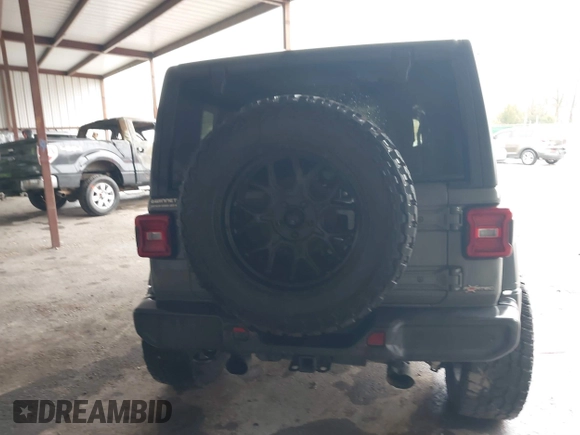 2020 Jeep Wrangler Unlimited Sport S z VIN 1C4HJXDG1LW103364, wystawiony jako IAAI lot #41541954 z przebiegiem 57 735 mil mil oraz . Historia ofert i sprzedaży dostępna na DreamBid. Obrazek 16.