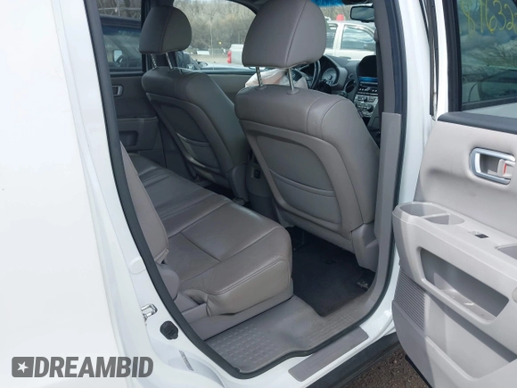 2012 Honda Pilot EX-L with VIN 5FNYF4H54CB057249, listed as a IAAI auction lot 41876322 with 180,641 mi miles and . Bid and sale history available at DreamBid. Image 8.