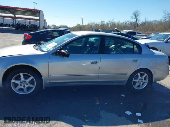 2003 Nissan Altima S with VIN 1N4AL11D63C321486, listed as a IAAI auction lot 41581386 with 200,082 mi miles. Bid and sale history available at carsss.com. Image 14.