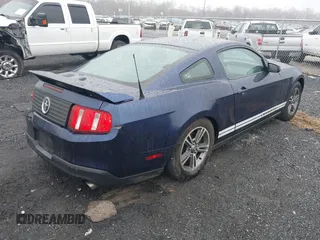 2012 Ford Mustang V6 Premium with VIN 1ZVBP8AM7C5268553, listed as a IAAI auction lot 41715730 with 97,848 mi miles. Bid and sale history available at carsss.com. Image 4.