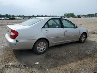 2004 Toyota Camry LE z VIN 4T1BE32K14U844858, wystawiony jako Copart lot #57564715 z przebiegiem 242 775 mil mil oraz Czysty tytuł • Clean title. Historia ofert i sprzedaży dostępna na DreamBid. Obrazek 3.