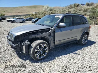 2012 BMW X5 50i with VIN 5UXZV8C53CL424949, listed as a Copart auction lot 60519055 with 130,041 mi miles and Salvage title. Bid and sale history available at DreamBid. Image 1.