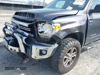 2016 Toyota Tundra 4WD Truck SR with VIN 5TFUW5F19GX548996, listed as a IAAI auction lot 41607605 with 101,194 mi miles. Bid and sale history available at carsss.com. Image 6.