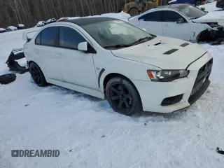 2010 Mitsubishi Lancer Evolution GSR with VIN JA32W8FV4AU604717, listed as a Copart auction lot 83896464 with 140,502 mi miles and Salvage Title. Bid and sale history available at DreamBid. Image 4.