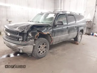 2004 Chevrolet Suburban Z71 with VIN 3GNFK16Z94G288951, listed as a IAAI auction lot 41697814 with 176,257 mi miles. Bid and sale history available at carsss.com. Image 2.