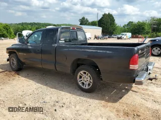 2001 Dodge Dakota z VIN 1B7GL22X81S204868, wystawiony jako Copart lot #57178895 z przebiegiem 298 667 mil mil oraz Szkoda całkowita • Salvage title. Historia ofert i sprzedaży dostępna na DreamBid. Obrazek 2.
